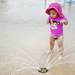 Whitmore Lake resident Anneliese Zimmer, 18 months, is surprised by water at the Blue Heron Bay at Independence Lake on Saturday, July 6. Daniel Brenner I AnnArbor.com
